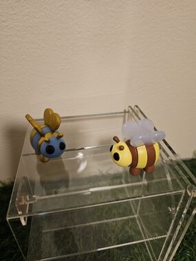 s an Adopt Me! Queen Bee action figures...2 Pcs